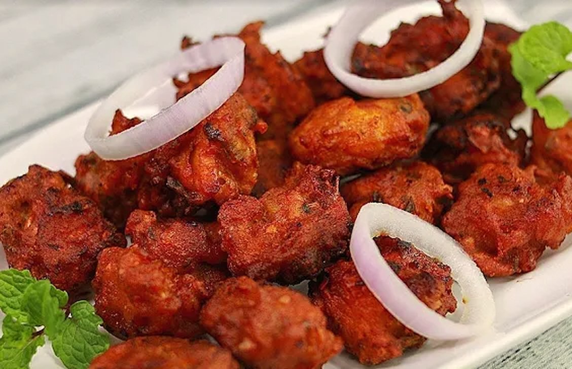 Crispy fried chicken starter with onion rings